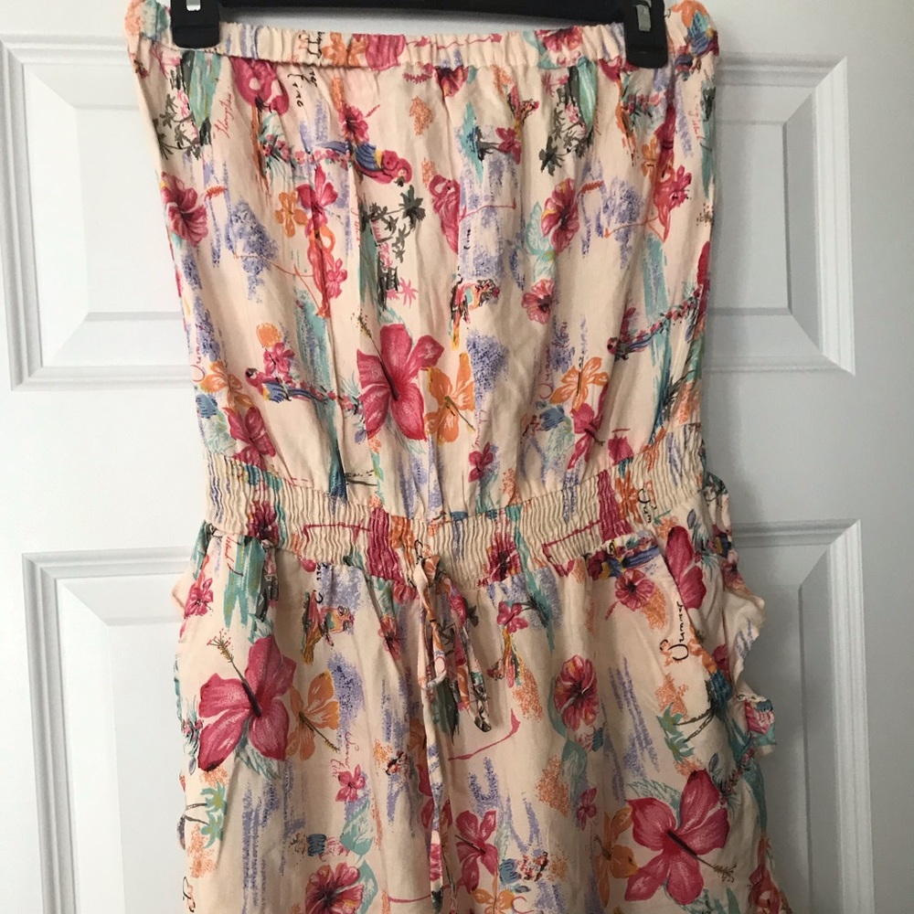 Brand New Ruffle Romper with pockets